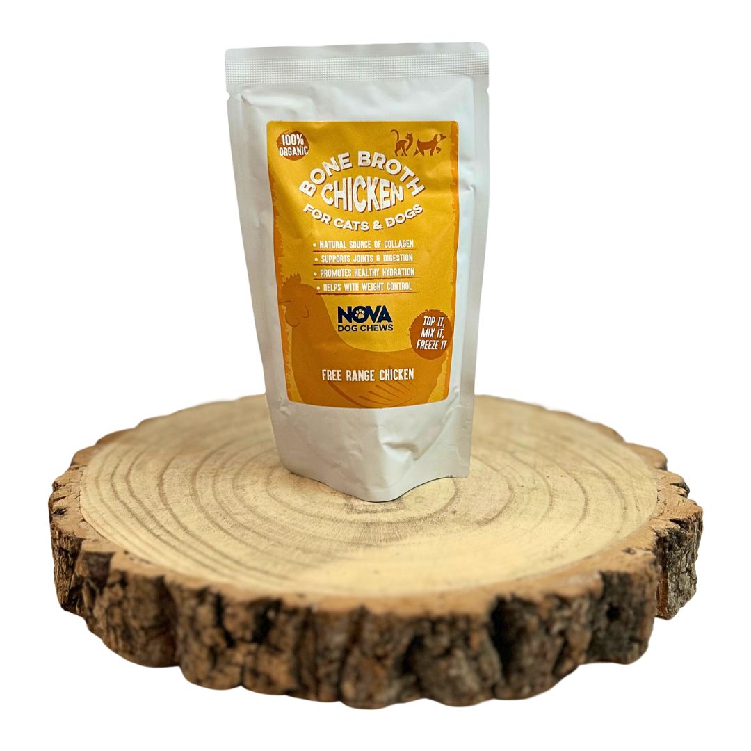 Dog bone broth poured over kibble as a nutritious meal toppe